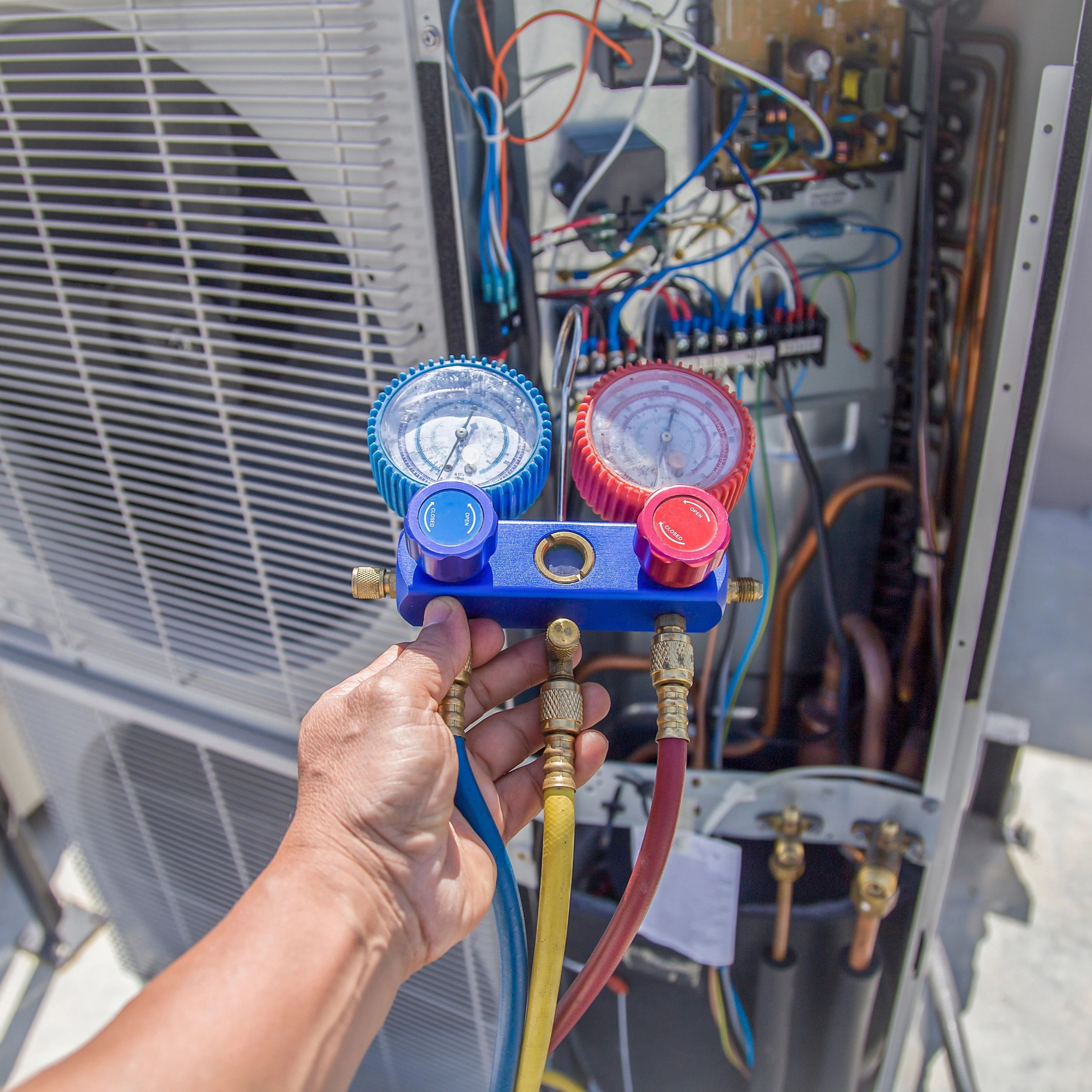 An AC TO THE MAX, INC technician delivering professional HVAC services in Phoenix.